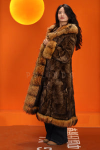 Penny lane in women's full length raccoon fur coat with shawl collar