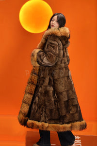 Penny lane in women's full length raccoon fur coat with shawl collar