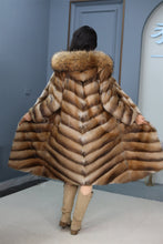 Load image into Gallery viewer, Full length muskrat fur hooded coat with racoon trim
