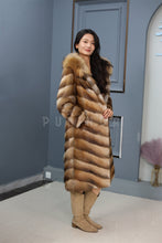 Load image into Gallery viewer, Full length muskrat fur hooded coat with racoon trim
