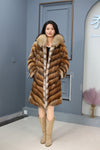 Full length muskrat fur hooded coat with racoon trim