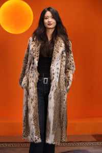 Full length women's natural lynx fur coat with shawl collar